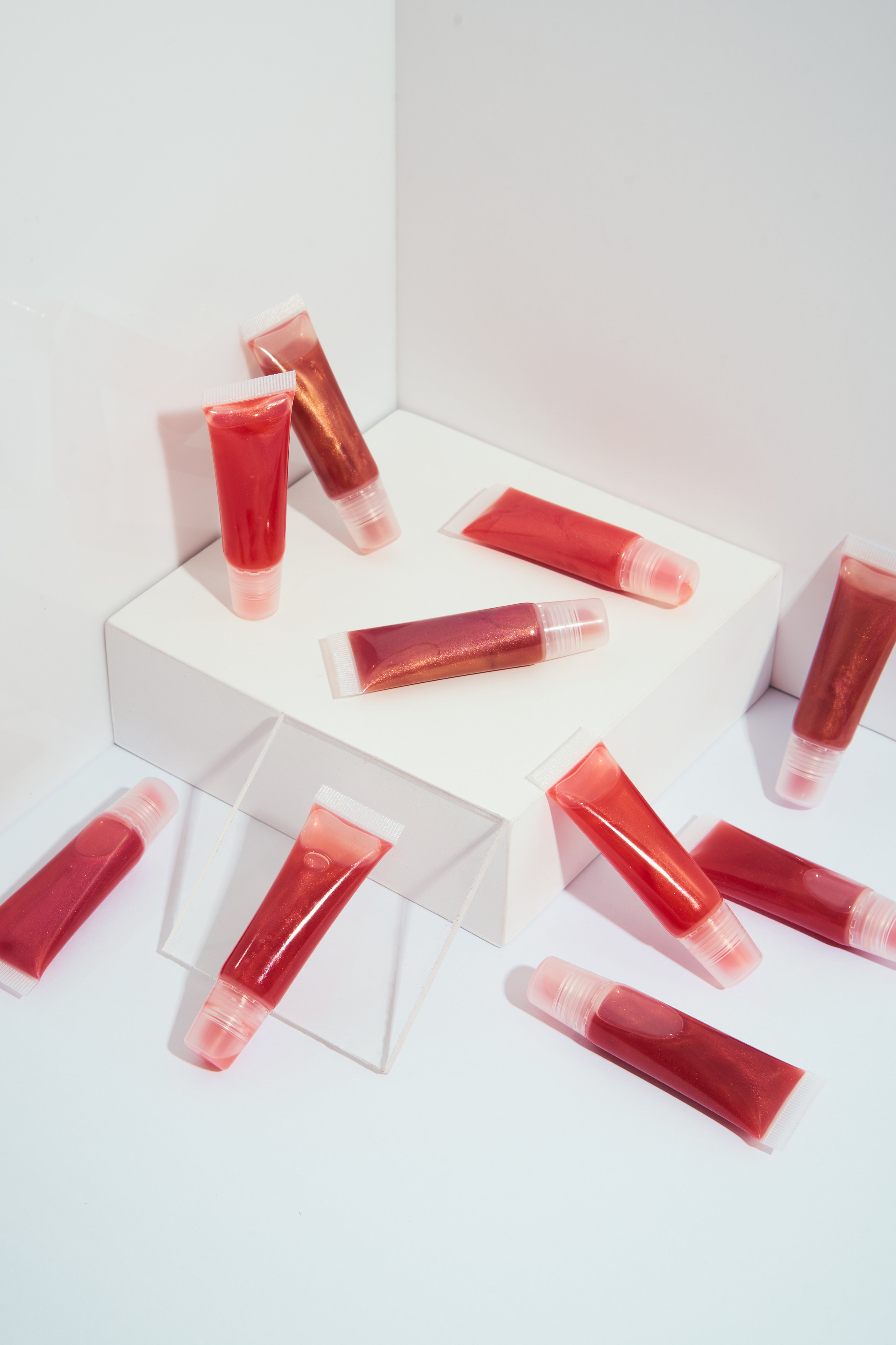 Lip Glosses on White Background